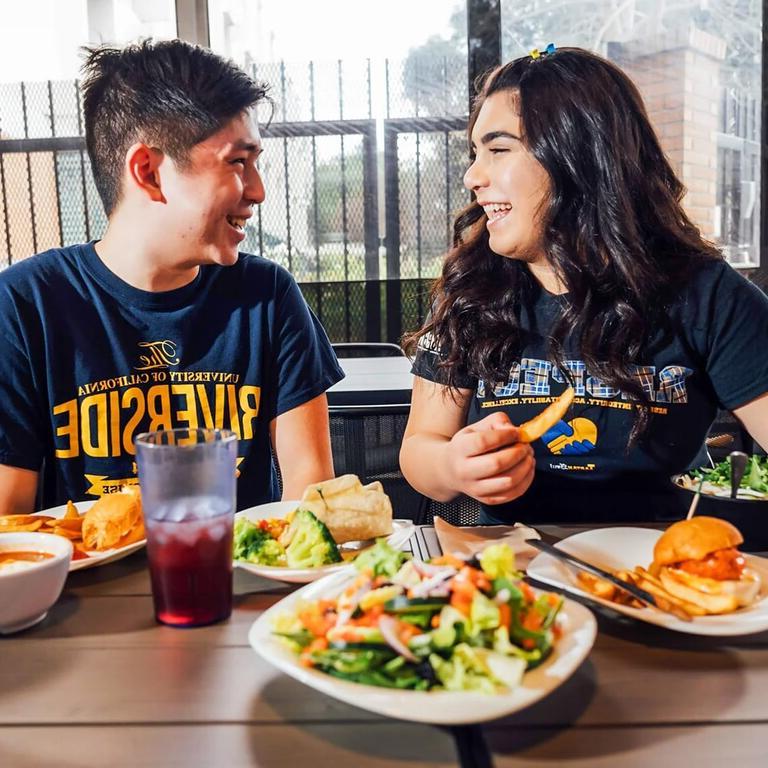 UCR Student eating on campus